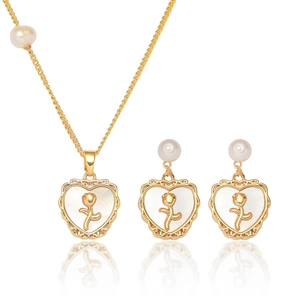Elegant gold heart jewelry set with pearl, shell inlay, and rose detail for women