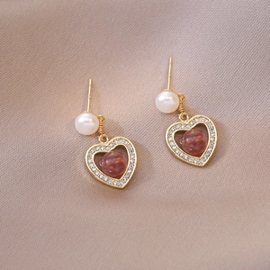 Elegant heart-shaped pearl earrings with pink gemstone and cubic zirconia accents
