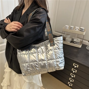 Silver quilted metallic tote bag with geometric ethnic woven shoulder strap for women