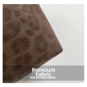 Primer plano de tela de leopardo con textura de terciopelo suave para bolsos de dama