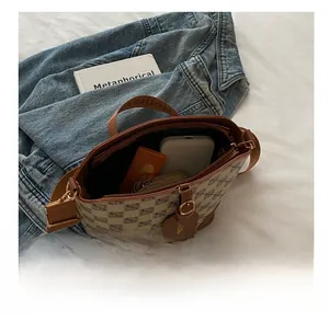 Top view of retro patterned bucket bag showing large interior space for daily essentials
