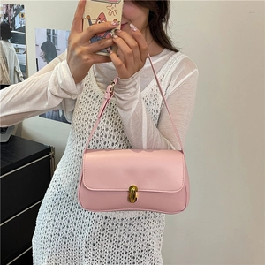 Pink minimalist faux leather underarm shoulder bag with golden metallic twist lock buckle