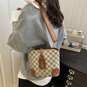 Classic beige bucket bag with logo pattern and brown leather trim for women