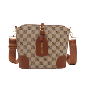 Vintage monogram bucket bag with brown leather trim and wide adjustable strap