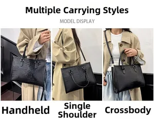 Borsa tote nera con motivo a coccodrillo portata a mano, a spalla e a tracolla