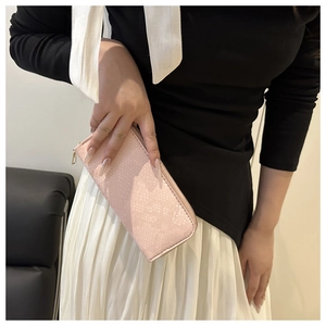 Pink snakeskin pattern long wallet in PU leather with zipper closure and textured finish