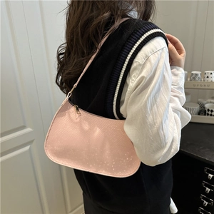 Pink crescent underarm bag with snake pattern texture and gold zipper for women