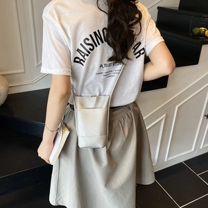 Silver textured leather mini crossbody bag for women with elegant thin shoulder strap