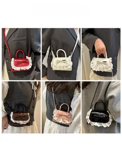 Mini lace bow handbag displayed in red white brown pink and black on models