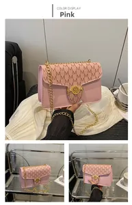 Close-up of pink crossbody bag featuring gold chain strap and M-patterned flap detail