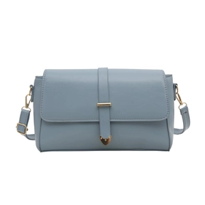 Piccola borsa a tracolla blu Morandi con barra dorata e punta a forma di cuore