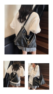 Détail du sac cabas vintage en cuir noir avec bretelles réglables et transformables