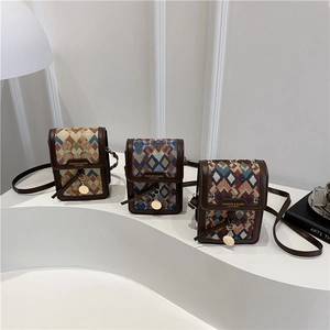 Retro geometric woven crossbody bags with brown leather trim and golden metal hardware