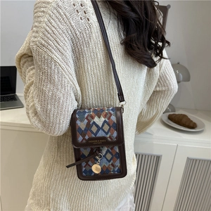 Retro diamond texture crossbody bag with dark brown leather trim and gold pendant