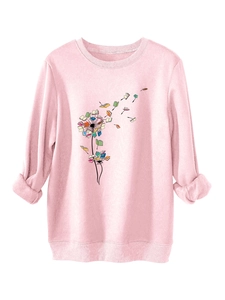 Detail of ribbed cuffs and hem on pink dandelion book print women's thick sweatshirt