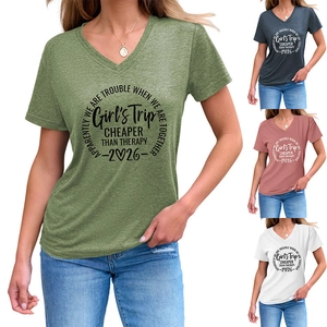 Detail showing V-neck short sleeve t-shirts with Girls Trip 2026 print in four colors