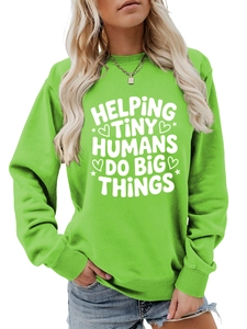 Detail of white screen-printed slogan on bright green crewneck sweatshirt fabric