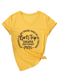 Detail of V-neck yellow cotton T-shirt with Girl's Trip print and side knot hem