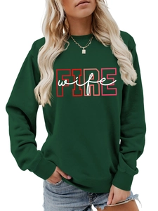 Close-up of dark green crewneck sweatshirt featuring red FIRE wife graphic and cotton texture