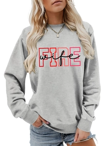 Detail of grey crewneck sweatshirt featuring red FIRE and black wife letter print