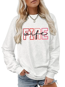 Detail of FIRE wife red and black graphic print on casual grey crewneck sweatshirt