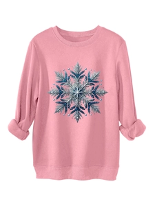 Detail van roze fleece sweatshirt met blauw pailletten sneeuwvlokpatroon en breisel