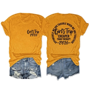 Front and back detail of orange cotton T-shirt with Girl's Trip 2026 slogan print