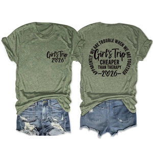 Front and back detail of green cotton blend t-shirt with Girls Trip 2026 graphic print