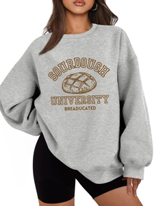 Detailed close-up of light gray sourdough university sweatshirt with ribbed cuffs