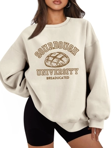 Detail of oversized sourdough university sweatshirt featuring vintage bread graphic print