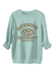Detail of mint green sweatshirt fleece lining and vintage sourdough university print