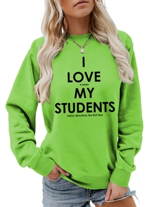 Détail du sweat vert pour enseignant avec texte I Love It When My Students Follow Directions