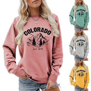 Detail of Colorado Est 1876 sweatshirts in pink, mint, grey and yellow colors