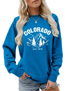 Detail of Colorado EST 1876 vintage mountain print on royal blue sweatshirt