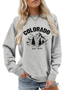 Detail of Colorado Est 1876 vintage graphic print on a grey crewneck sweatshirt