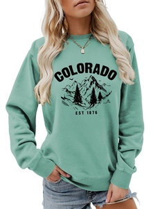 Detail of Colorado EST print on mint green drop shoulder sweatshirt for casual wear