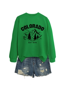 Detail view of Colorado graphic green sweatshirt with distressed denim shorts set