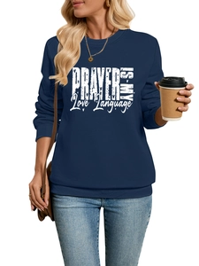 Detail of the navy blue sweatshirt featuring white Prayer Is My Love Language lettering