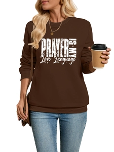 Detail of dark coffee sweatshirt featuring white PRAYER IS MY LOVE LANGUAGE lettering