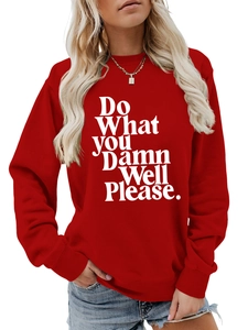 Detail of red crewneck sweatshirt featuring Do What You Damn Well Please slogan print