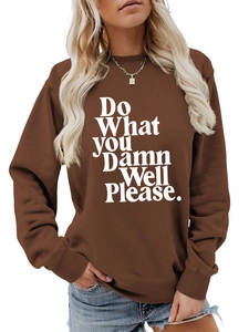 Close-up of white letter print on a dark brown crewneck sweatshirt fabric