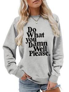 Close-up of grey sweatshirt fabric with 'Do What You Damn Well Please' printed text