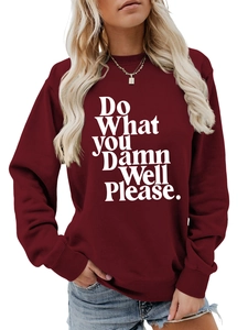 Close-up of the quote 'Do What you Damn Well Please' printed on a burgundy sweatshirt