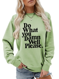 Detail of light green sweatshirt featuring black Do What You Damn Well Please typography