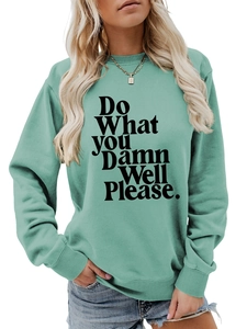 Close-up of mint green sweatshirt with 'Do What YOU Damn Well Please' printed text