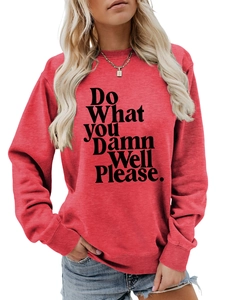 Close-up of red crew neck sweatshirt featuring 'Do What you Damn Well Please' text
