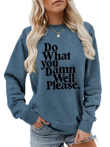 Detail of blue crewneck sweatshirt with 'Do What You Damn Well Please' slogan print