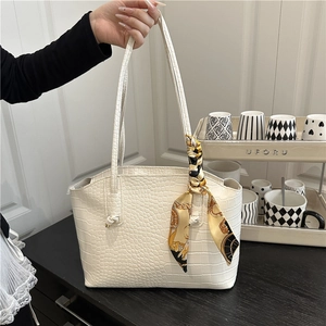 White crocodile pattern tote bag with decorative silk scarf and long top handles
