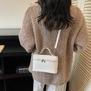 Minimalist white leather box bag with litchi texture and adjustable shoulder strap