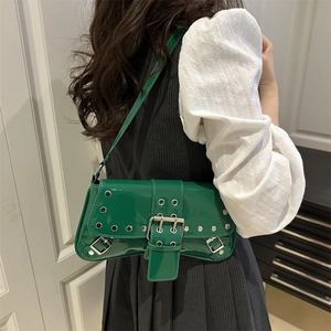 Neon green Y2K baguette bag with metallic rivets and silver buckle details